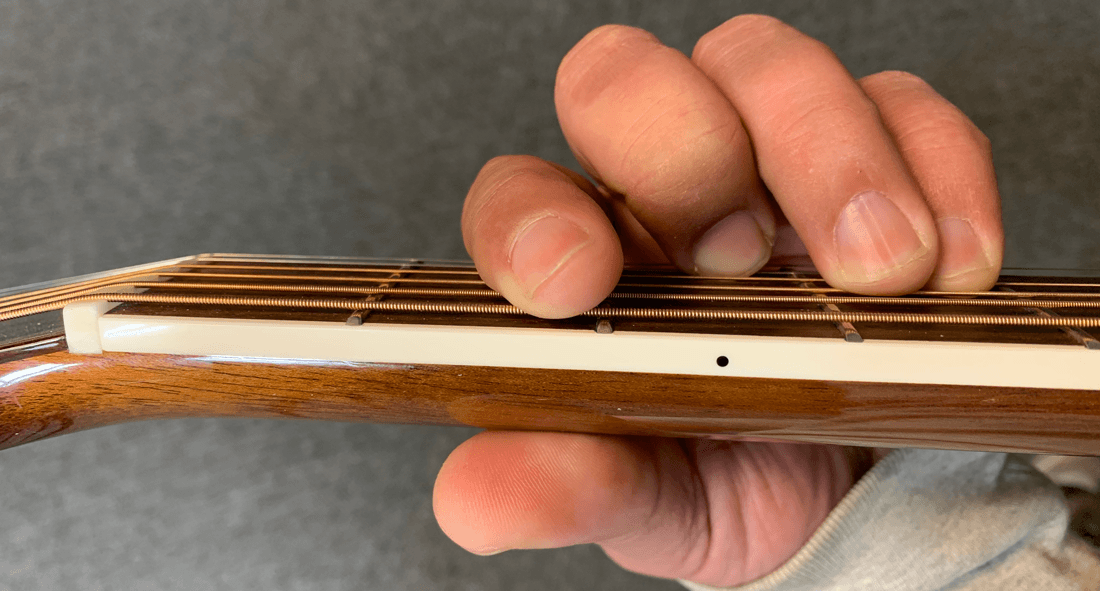 Bm guitar chord from player view